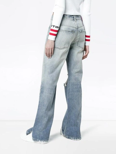 Shop Adaptation Flared Jeans With Rip Detail In Blue