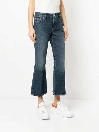 Shop Alexander Mcqueen Flared Cropped Jeans In Blue