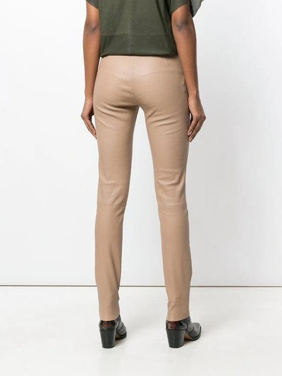 Shop Drome Skinny Trousers In Neutrals