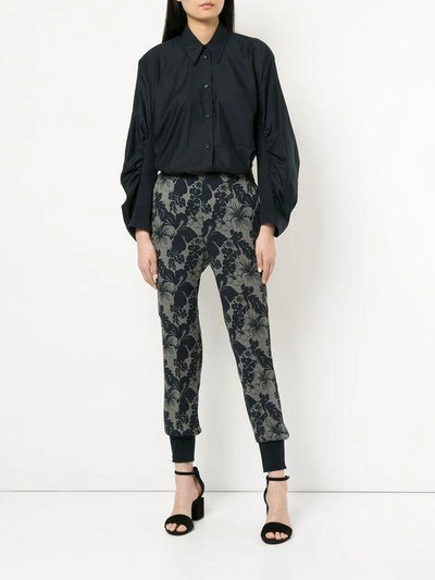 Shop Stella Mccartney Hibiscus Print Trousers - Grey