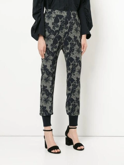 Shop Stella Mccartney Hibiscus Print Trousers - Grey