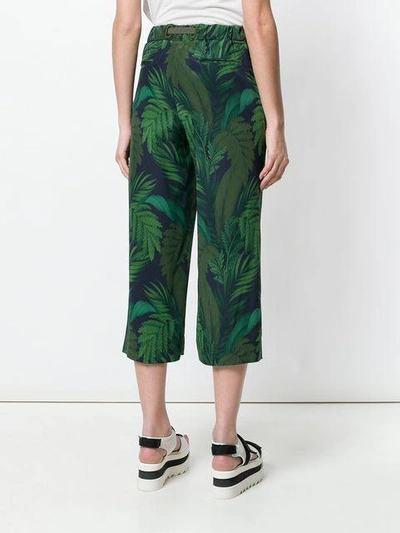 Shop Moncler Fougeres Print Cropped Trousers In Green