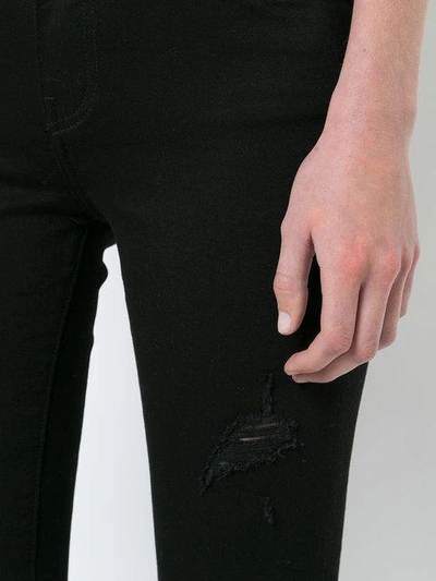 Shop Amiri Thrasher Distressed Skinny Jeans In Black