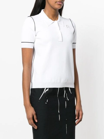 contrast detail polo top