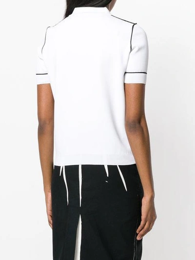 contrast detail polo top