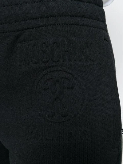 Shop Moschino Tapered Track Trousers - Black