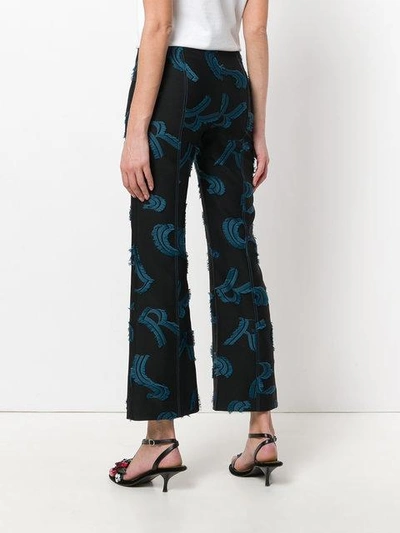 Shop Sonia Rykiel Monogram Print Flared Trousers