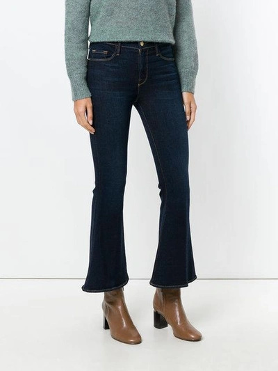 Shop Frame Flared Jeans In Blue