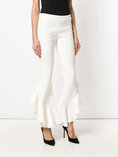 Shop Giambattista Valli Ruffled Hem Cropped Trousers - White