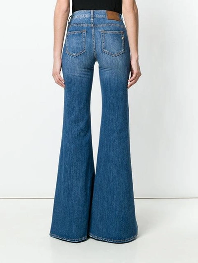 Shop Dondup Faded Distressed Detail Flared Jeans - Blue