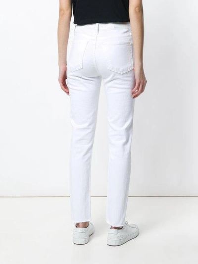 Shop Re/done Classic Skinny Jeans In White
