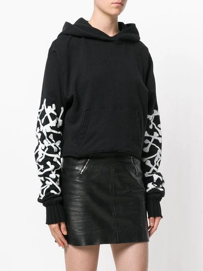 Shop Amiri Bones Star Cropped Hoodie - Black