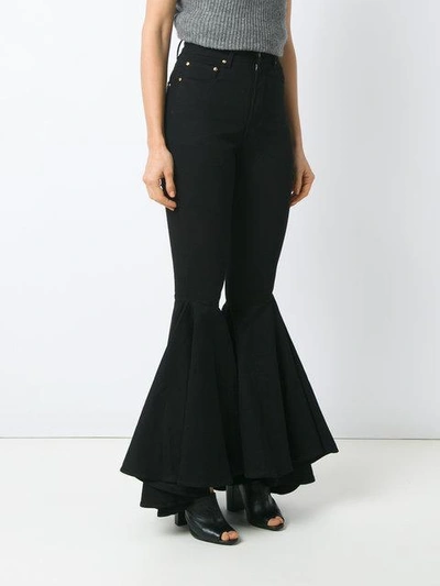 Shop Amapô Flared Trousers In Black