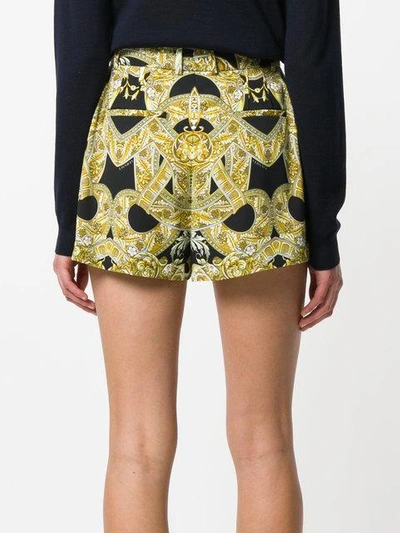 Shop Versace Signature Print Shorts In Yellow