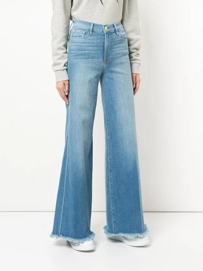 Shop Frame Le Palazzo Raw Edge Jeans In Blue