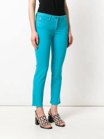 Shop Roberto Cavalli Cropped Trousers In Blue