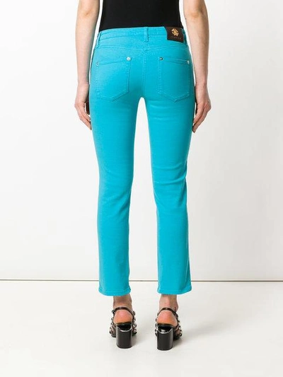 Shop Roberto Cavalli Cropped Trousers In Blue
