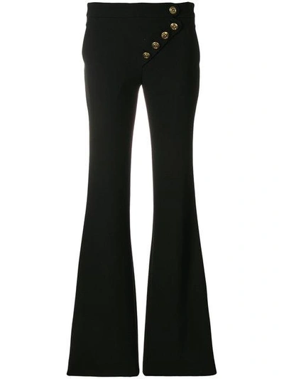Shop Chloé Asymmetric Flared Trousers - Black