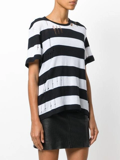Shop Amiri Distressed Striped T-shirt - Black