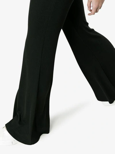 Shop Beaufille High Waisted Flared Trousers - Black