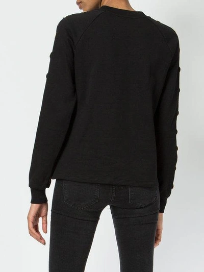 Shop Balmain Embossed Coin Sweatshirt - Black