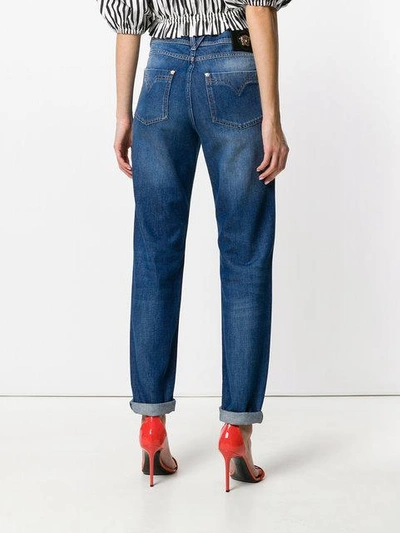 Shop Versace Chain-trimmed Jeans In Blue