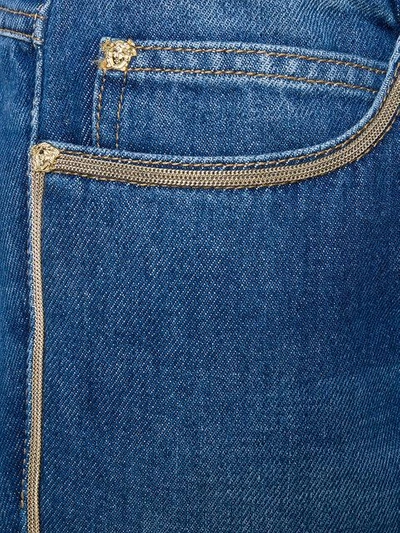 chain-trimmed jeans