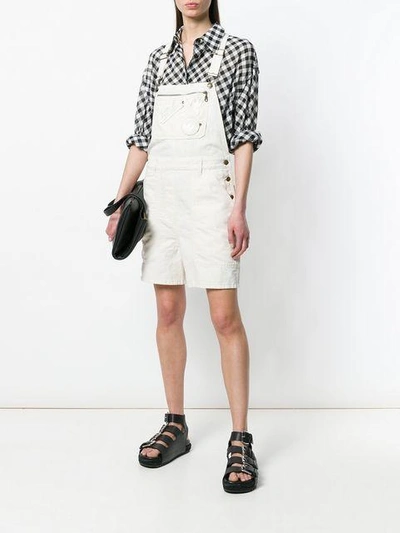 Shop Mcq By Alexander Mcqueen Swallow Badge Dungarees In White