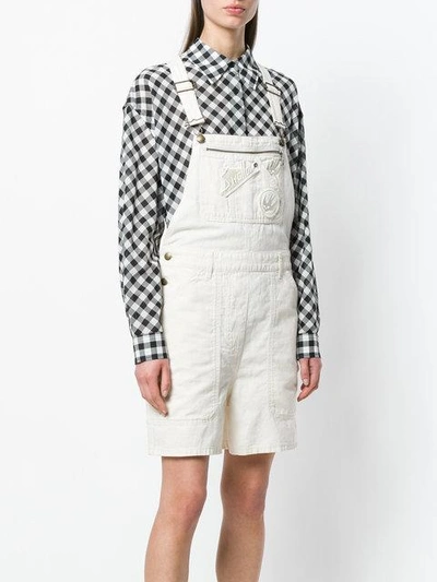 Shop Mcq By Alexander Mcqueen Swallow Badge Dungarees In White