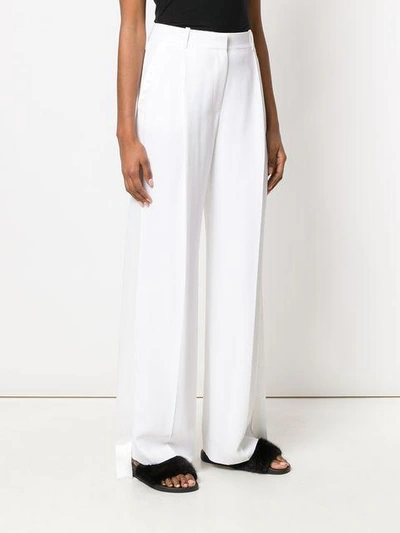 Shop Givenchy Side Stripe Tailored Trousers In White