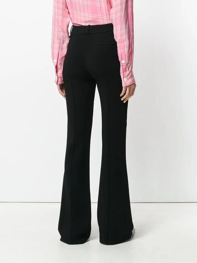 Shop Victoria Beckham Tailored Flared Trousers - Black
