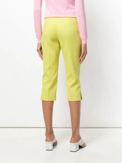 Shop Boutique Moschino Cropped Tailored Trousers In Yellow