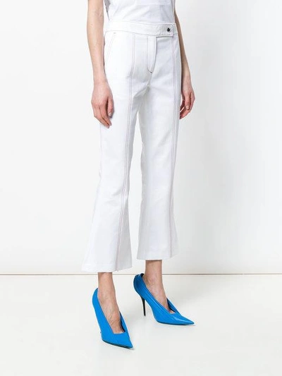 Shop Msgm Topstitch Kick Flare Jeans In White