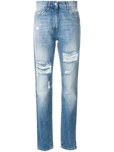 Shop Moschino Distressed Denim Trousers In Blue