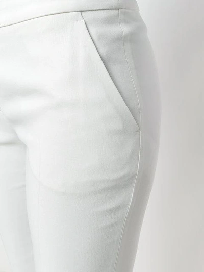 Shop Alexander Mcqueen Kickback Trousers - White