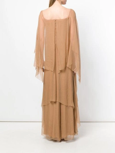 layered evening dress with asymmetrical sleeves