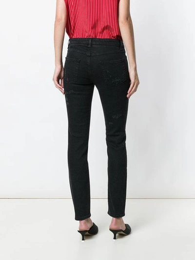 Shop Dolce & Gabbana Sacred Heart Skinny Jeans In Black