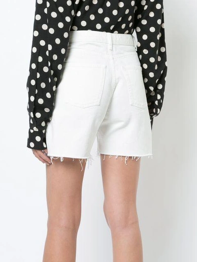 Shop Saint Laurent Baggy Frayed Shorts - White