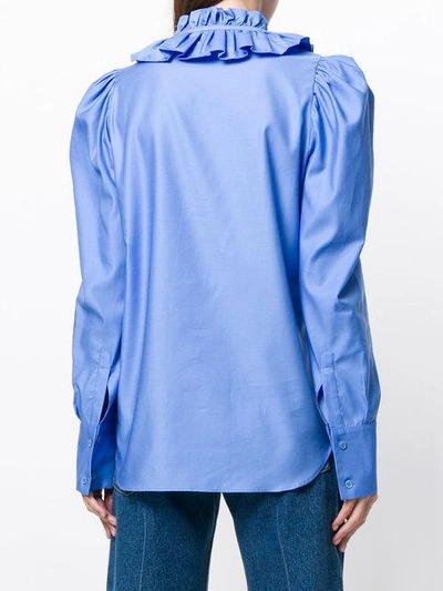 ruffled neck shirt