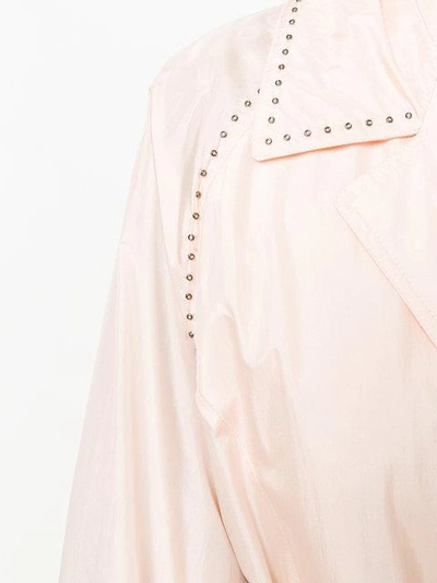 eyelet studded trench coat