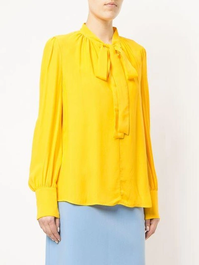 Shop Msgm Pussy-bow Blouse In Yellow
