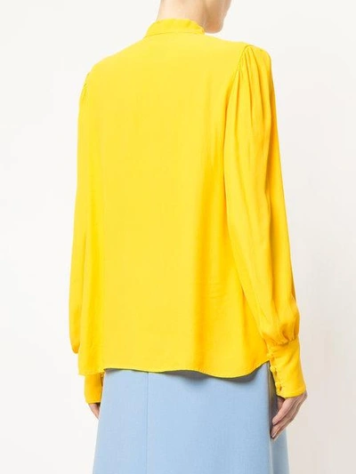 Shop Msgm Pussy-bow Blouse In Yellow