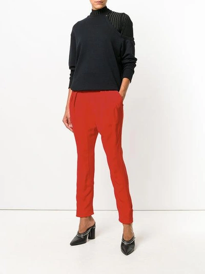 Shop Givenchy Tapered Trousers In Red