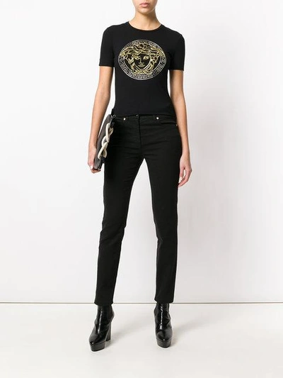 Shop Versace Slim Fit Jeans