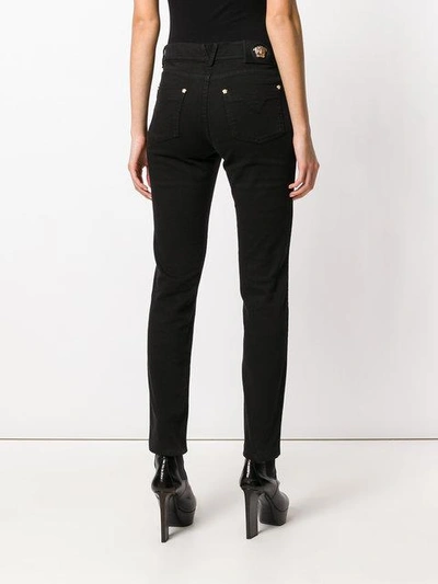 Shop Versace Slim Fit Jeans