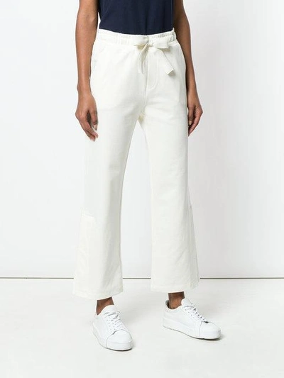Shop Moncler Cropped Track Pants In White