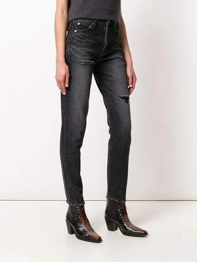 distressed effect tapered jeans