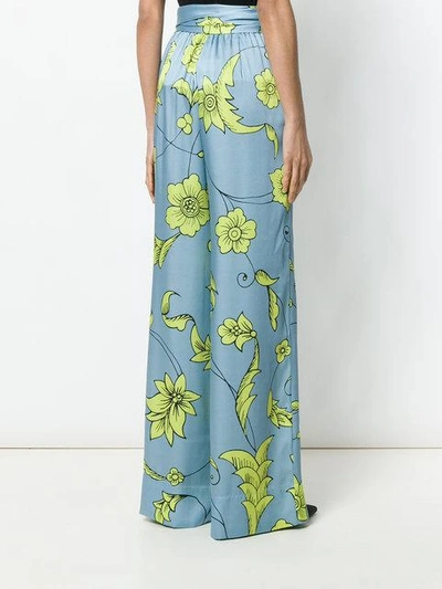 Shop Miahatami Floral Tie Waist Palazzo Trousers In Blue