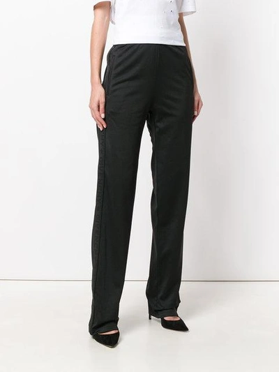 Shop Givenchy Logo Trim Track Pants In Black