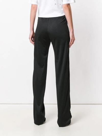 Shop Givenchy Logo Trim Track Pants In Black